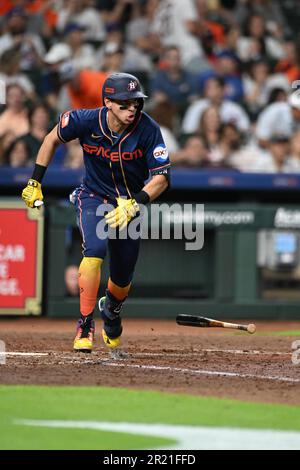 Houston Astros shortstop Mauricio Dubon (14) hits an RBI single to left  field in the bottom of the fifth inning of the MLB game between the Houston  As Stock Photo - Alamy