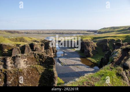 View of the cliffs and a river from above Fjadrargljufur Canyon Iceland Stock Photo