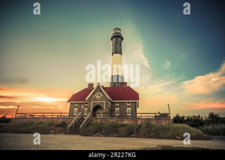 Beautiful view of historic Fire Island Lighthouse along Fire Island National Seashore on Long Island New York seen at evening sunset. Stock Photo