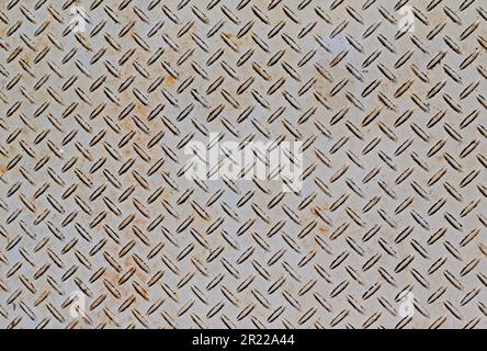 Metallic surface pattern on floor Stock Photo