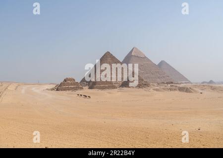The Giza pyramid complex also called the Giza Necropolis against the blue sky Stock Photo