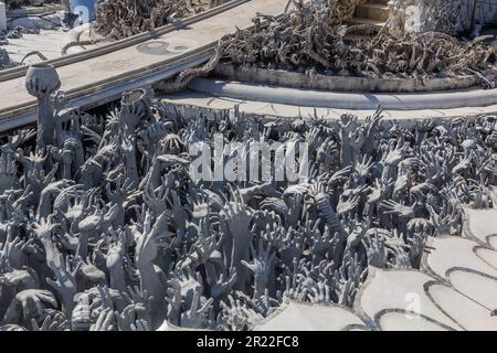 Bridge of 'the cycle of rebirth' at Wat Rong Khun (White Temple) in Chiang Rai province, Thailand Stock Photo