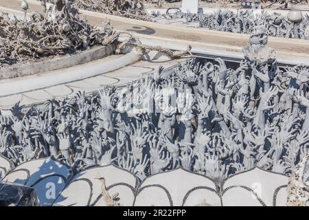 Bridge of 'the cycle of rebirth' at Wat Rong Khun (White Temple) in Chiang Rai province, Thailand Stock Photo