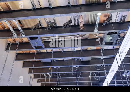 Theater stage rigging with theatrical equipment, lighting, supports ...