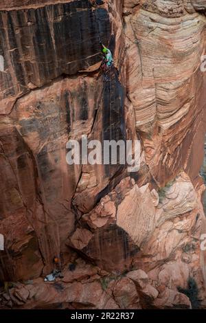 A rock climber spotted in Zion National Park Stock Photo