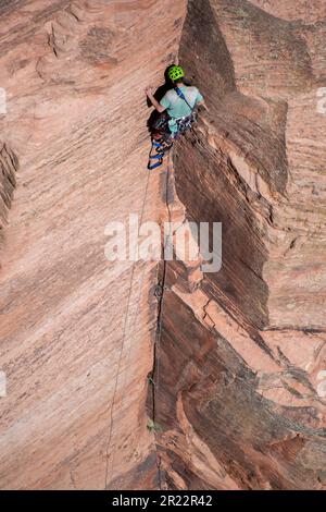 A rock climber spotted in Zion National Park Stock Photo