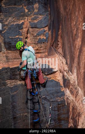 A rock climber spotted in Zion National Park Stock Photo