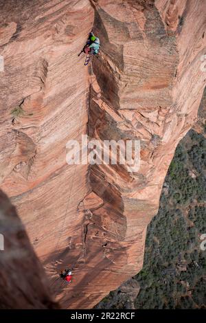 A rock climber spotted in Zion National Park Stock Photo