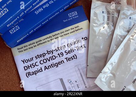 Blue boxes of NHS Test & Trace Covid-19 self-test (Rapid Antigen Test), Cheshire, England, UK, WA4 Stock Photo