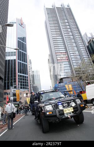 NSW police officers are seen in front of the Opera House in Sydney ...