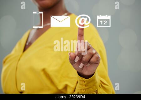 Woman, hands and hologram icons for email, global communication or social media in contact us. Hand of female person touching holographic icon of Stock Photo