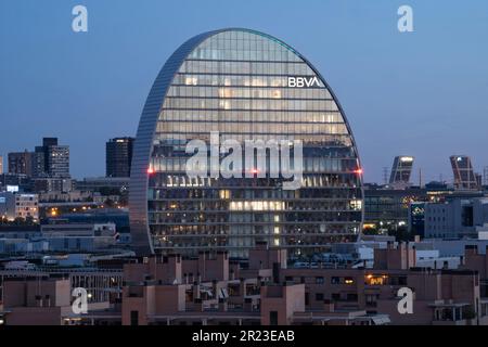 Madrid, Spain; April 5 2023: Evening in Madrid, Spain with the view of its skyline and business area 'La Vela', BBVA bank headquarters building. Stock Photo