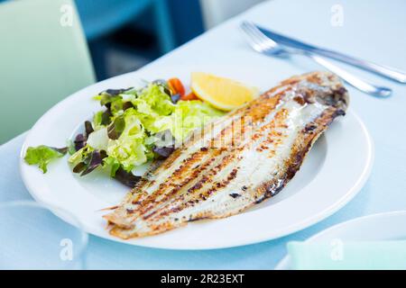 Grilled sole. Grilled fish in a restaurant on the Spanish coast. Stock Photo