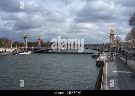 Pont Alexandre III bridge on a cloudy spring day in Paris, France. March 25, 2023. Stock Photo