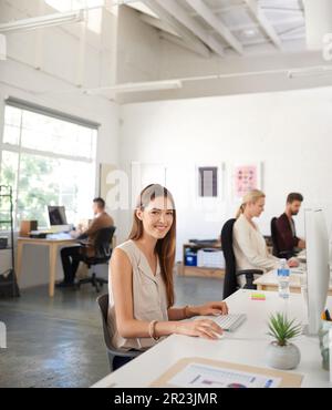 Ready to redefine the busines. Bright modern office space with creative professionals at work. Stock Photo