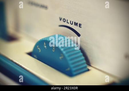 Volume control on reel tape recorder. Vintage effect Stock Photo