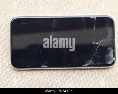 Broken glass shield or film screen cover of smartphone -  safety and protection concept Stock Photo