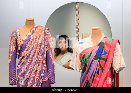 London, UK. 17th May, 2023. The Design Museum's Priya Khanchandani (curator) poses with the saris. 'The Offbeat Sari' is the very first major UK exhibition on the contemporary sari, with 60 stunning saris on displa at the Design Museum, Kensington. The exhibits will be on display 19 May - 17 September 2023. Credit: Imageplotter/EMPICS/Alamy Live News Stock Photo