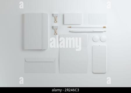 Top view Office stationery set, envelope, sheet, business cards, pencil, pen and notebook. Mockup design. 3d illustration. Stock Photo