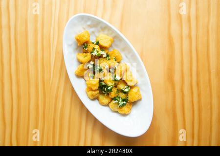 Txokos. Spanish tapa of fried squid. Stock Photo