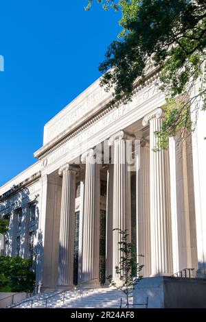 Boston, MA, USA-August 2022; Low angle vertical view of the entrance with stairs and columns and façade of Massachusetts Institute of Technology (MIT) Stock Photo