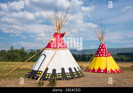 The Painted Native American Teepees Saint Mary Lodge Resort Saint Marys Glacier National Park Montana Stock Photo