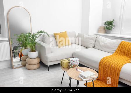 Gift boxes on table in living room Stock Photo