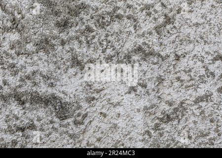 Rough textures on a white wall, the surface is uneven. Texturized uneven wall. Stock Photo
