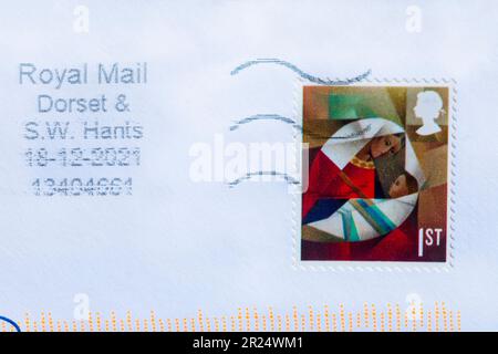 1st class Christmas stamp stuck on white envelope 2022 Stock Photo