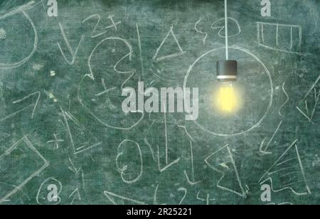 Innovation,idea,vision,simplicity business concept, light bulb in circle surrounded by chaotic forms on blackboard. Stock Photo