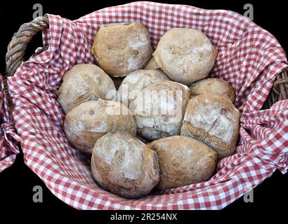 Handmade bread, for sale in an outdoor market in Barcelona, Spain. Stock Photo