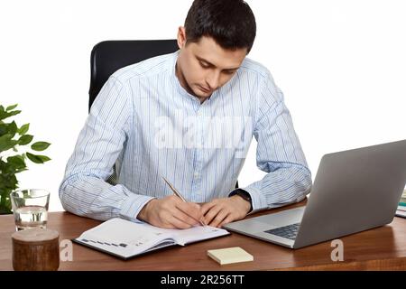 businessman taking notes, doing market research working Stock Photo