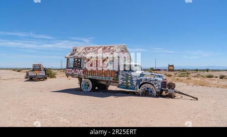 Niland, California - May 25, 2020: Old painted truck with Bible verses at Leonard Knight's Salvation Mountain. Stock Photo