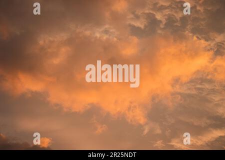 Cloudscape, Colored Clouds at Sunset near the Ocean in a Tropical Climate Stock Photo