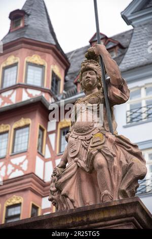 Frankfurt am Main, Germany-August 8, 2021: The statue of Minerva, or Minervabrunnen is seen in the Römerberg area of Frankfurt. Stock Photo