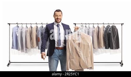 https://l450v.alamy.com/450v/2r25yc1/man-in-front-of-clothing-racks-collecting-a-suit-from-dry-cleaners-isolated-on-a-white-background-2r25yc1.jpg