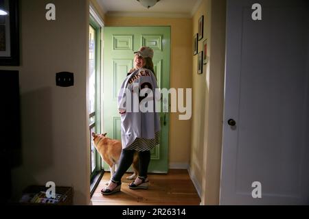 Nanita Cranford poses for a portrait with some of her Giants gear at her  homel on Friday, November 10, 2017 in Oakland, Calif. Cranford is a Giants  fan who switched her World