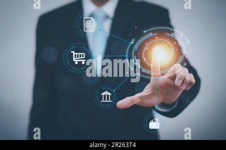 Business using thumb to scan finger print or for digital processing biometric identification to access security system includes internet banking, clou Stock Photo