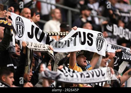 Turin, Italy, 14th May 2023. Juventus fans hold up scarves as the