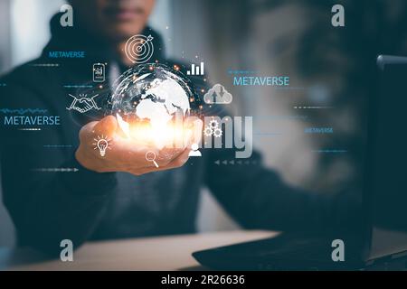 New metaverse with icon business concept,Business hand holding a virtual globe with financial icons future technology, business goals, online communic Stock Photo