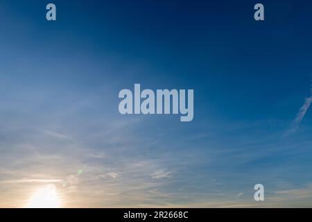 blue sky with light veil clouds - cirrostratus Stock Photo