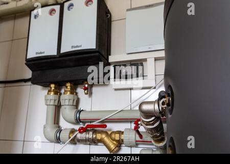 May 17, 2023, Horenka, Ukraine: A heat pomp is seen in a building of a public medical clinic in Horenka (one of the most destroyed towns during the fight to defend Kyiv in March 2022). The solar panel system as well as heat pomp were installed in the clinic as the building was reconstructed after being destroyed in the fight. The idea is to keep vital public institutions independent both from Russian gas as well as potential destruction of regional power plants. Environmental NGO call for government to implement green recovery plan. The Horenka clinic project was managed by Ecoaction and spons Stock Photo