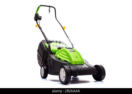 Garden electric lawn mower with a grass collector isolated on white background Stock Photo