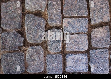 Background with stone cobblestone on a path Stock Photo