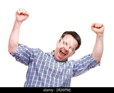 Confidence grows with age. A cropped portrait of a middle-aged man raising his arms excitedly, isolated on white. Stock Photo