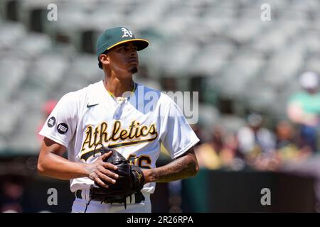 Arizona Diamondbacks' Corbin Carroll checks his swing on a high pitch  during the first inning of the team's baseball game against the Cincinnati  Reds on Saturday, Aug. 26, 2023, in Phoenix. (AP