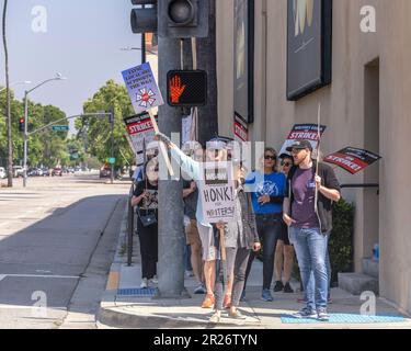 May 17, 2023 - Burbank, CA, USA: Members of the Writers Guild of America strike outside Warner Brothers studio in Burbank, CA. Stock Photo