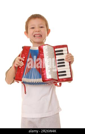 Isolated young boy playing a diatonic accordion Stock Photo