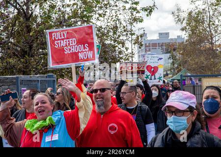 Members of Service Employees International Union Local 99 along with support from LAUSD teachers, strike for a third straight day and march to attend Stock Photo
