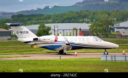 glasgow airport private jet on runway Stock Photo